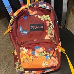 Jansport Maroon Backpack with Floral and Butterfly Design